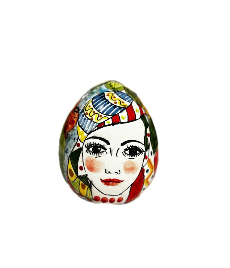 Uovo decorativo - stile siciliano con volto, limoni e fichi d’india