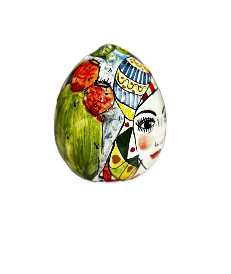 Uovo decorativo - stile siciliano con volto, limoni e fichi d’india