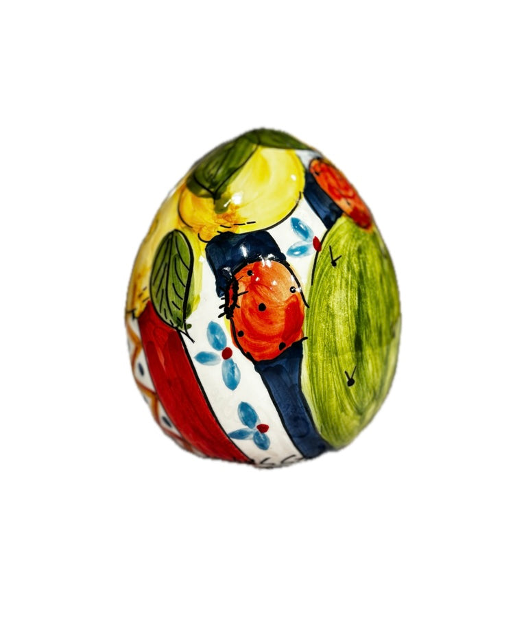 Uovo decorativo - stile siciliano con volto, limoni e fichi d’india