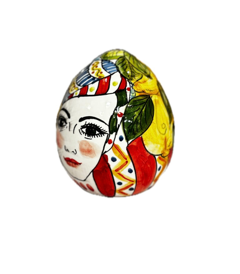 Uovo decorativo - stile siciliano con volto, limoni e fichi d’india
